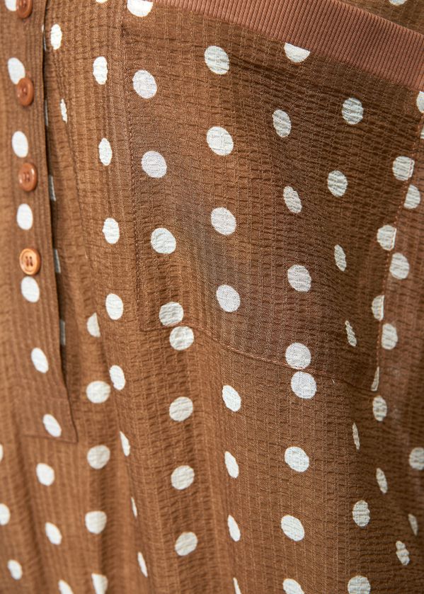 brown with white polka dot fabric