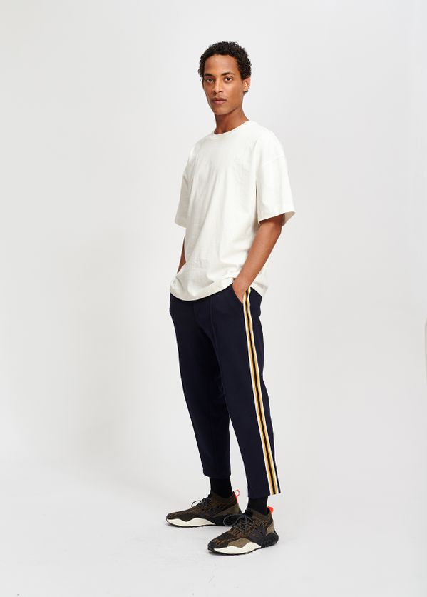 blue track pants with white stripe