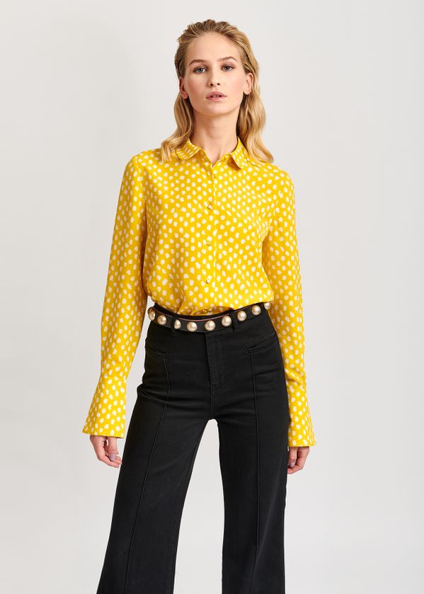 yellow and white polka dot shirt