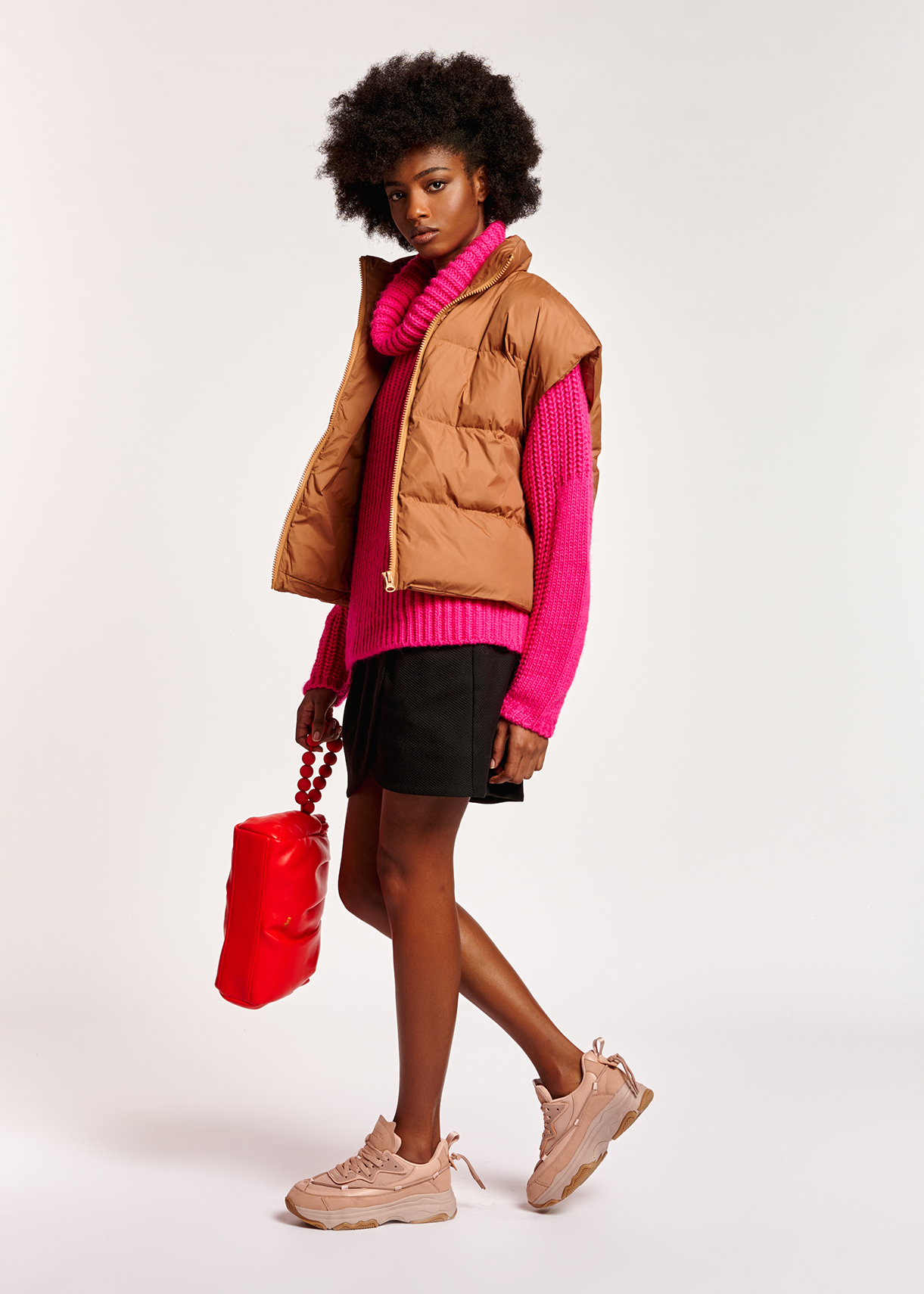 red sleeveless puffer jacket