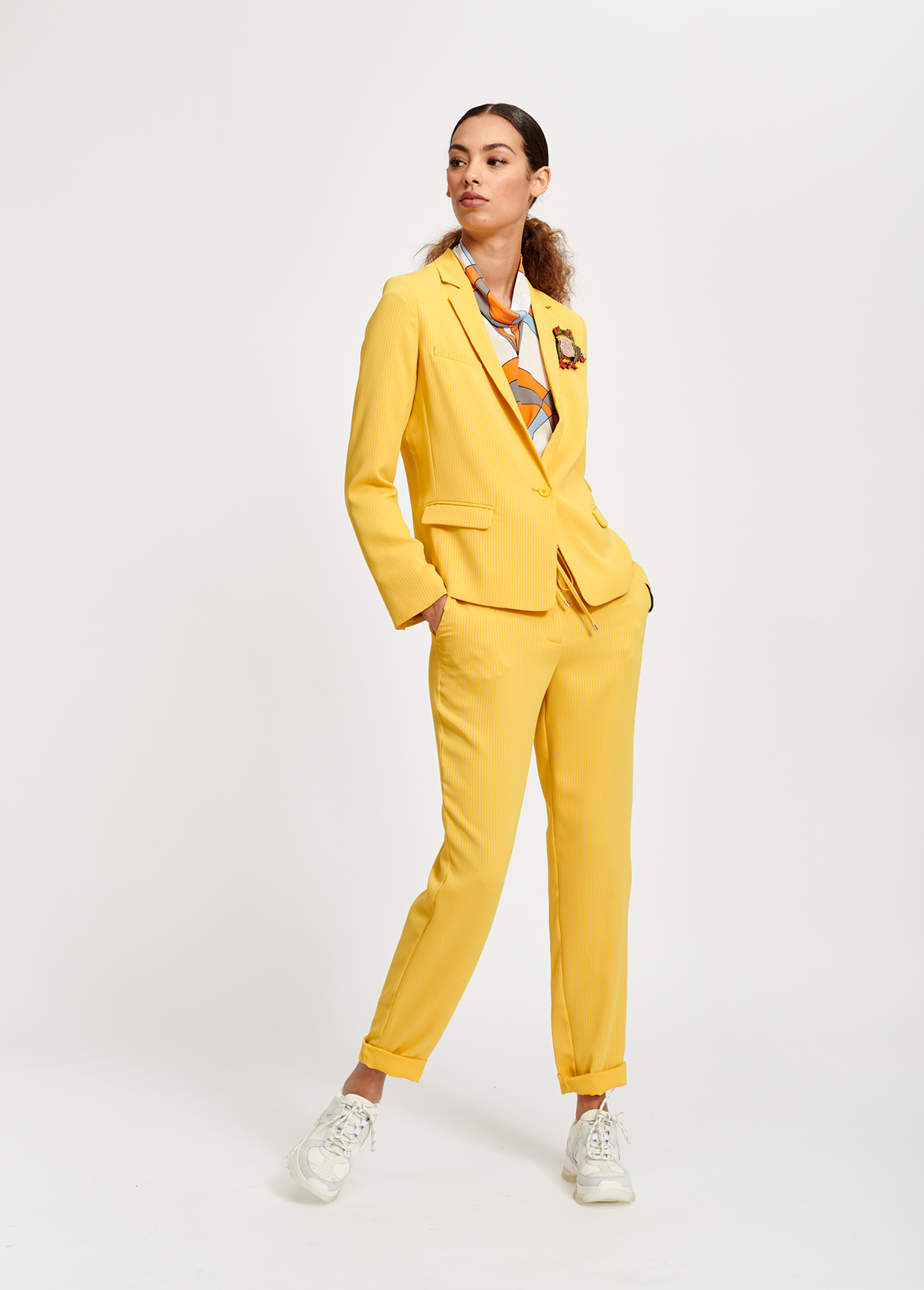 yellow tapered trousers
